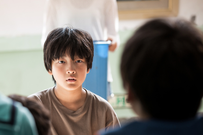 Child actor Lee Hyo-je, 12, stars in the film “Vanishing Time: A Boy Who Returned,” slated to hit theaters on Nov. 16. (Showbox)