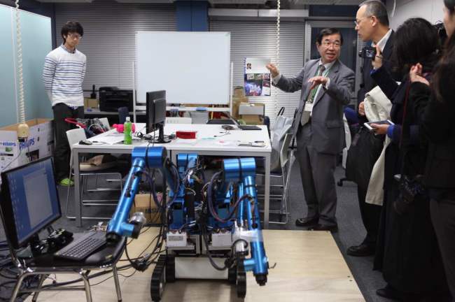 Prof. Yamakawa Hiroshi explains about his robot project at Waseda University on Nov. 11. (Park Ga-young/The Korea Herald)