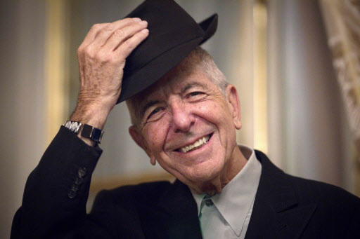 This file photo taken on Jan. 16, 2012 shows Canadian singer and poet Leonard Cohen taking off his hat to salute in Paris. (AFP-Yonhap)