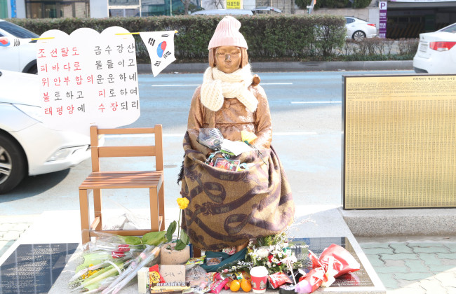 'Comfort women' statue in front of the Japanese Consulate building in Busan (Yonhap)