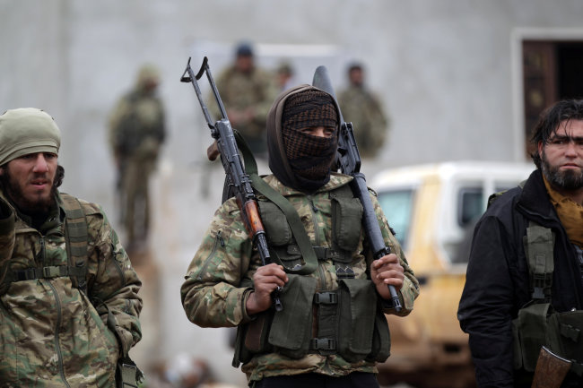 A rebel fighter on the outskirts of northern Syria (Reuters-Yonhap)