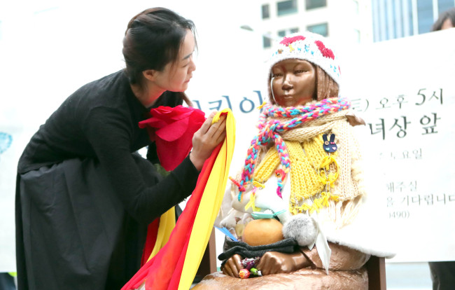 Comfort women statue in front of the Japanese consulate building in Busan (Yonhap)