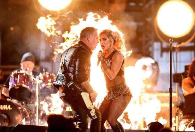 Lady Gaga, right, and James Hetfield of Metallica perform “Moth Into Flame” at the 59th annual Grammy Awards on Sunday, in Los Angeles. (AP-Yonhap)