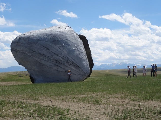Tourists observe “Beartooth Portal,” a work by Spanish sculptors Anton Garcia-Abril and Debora Mesa, known together as Ensamble Studio, at the Tippet Rise Art Center near Fishtail, Montana, July 15, 2016. (AFP-Yonhap)
