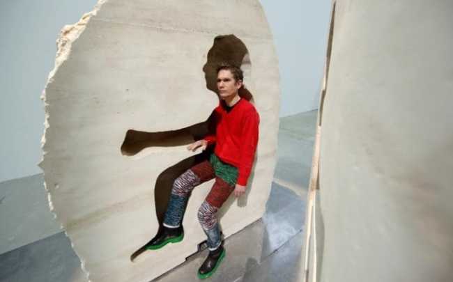 French artist Abraham Poincheval performs “Pierre” (“Stone”), at the Palais de Tokyo on Wednesday in Paris. (AFP-Yonhap)