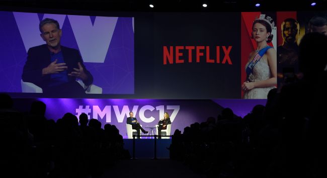 Founder and CEO of Netflix Reed Hastings speaks during a keynote speech at the Mobile World Congress in Barcelona on Monday. (AFP-Yonhap)