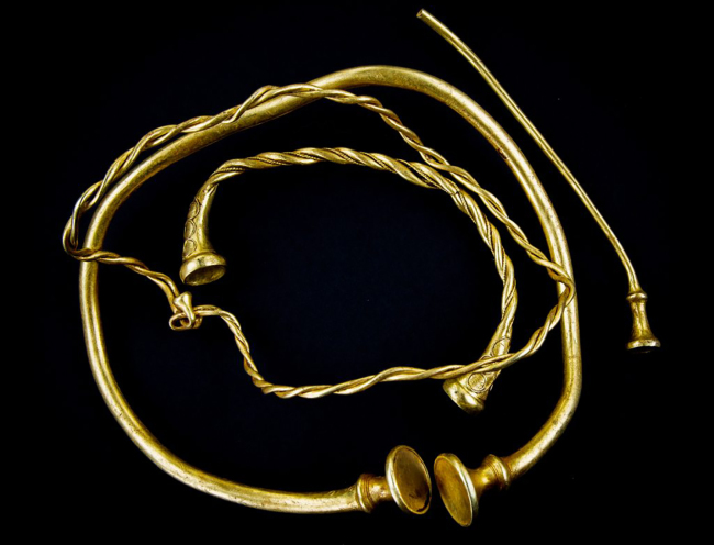 A handout image made available by Staffordshire County Council on Tuesday shows a collection of Iron Age gold jewelry that were discovered in a field in Staffordshire, central England in December 2016. (AFP-Yonhap)