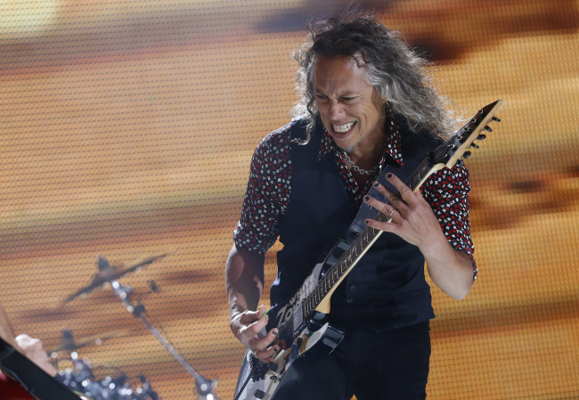 Kirk Hammett, guitarist of the heavy metal rock band Metallica, performs in a concert in Mexico City, Sunday. (AP-Yonhap)