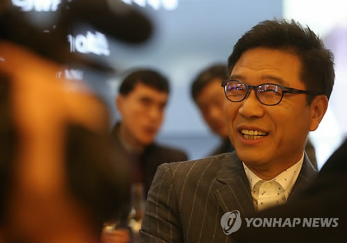 This file photo shows Lee Soo-man, chairman of SM Entertainment, at the opening event for SM Entertainment's COEX Artium in southern Seoul on Jan. 13, 2015. (Yonhap)