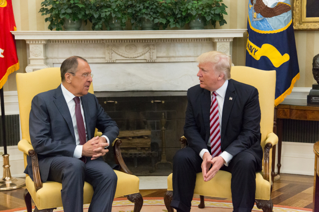 President Donald Trump (right) speaks with Russian Foreign Minister Sergey Lavrov in the Oval Office, at the White House in Washington on May 10.   UPI-Yonhap