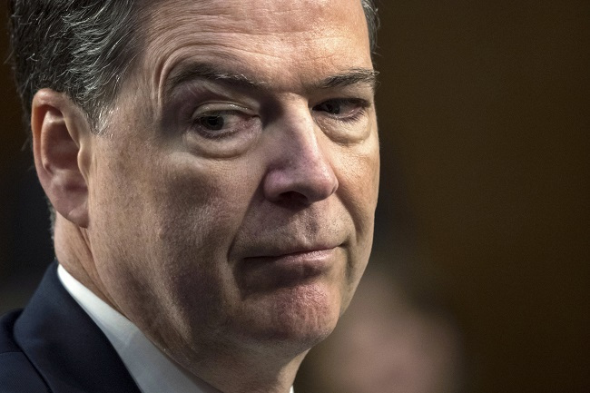 Former FBI director James Comey testifies before the Senate Select Committee on Intelligence, on Capitol Hill in Washington, Thursday, June 8, 2017. (AP-Yonhap)