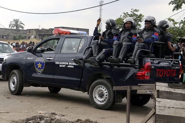 Congolese police patrol outside the main prison in Kinshasa, Congo. (AP-Yonhap)