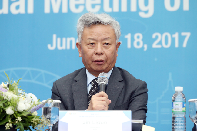 AIIB President Jin Liqun delivers a speech at the opening ceremony of the second annual meeting of governors at the International Convention Center in Seogwipo, Jeju Island, Friday. (Yonhap)