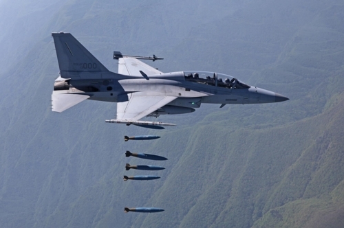 A FA-50 light combat jet conducts a bombing exercise in this photo provided by the Defense Acquisition Program Administration. (Yonhap)