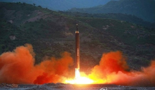 This photo carried by North Korea's Rodong Sinmun newspaper on May 15, 2017, shows the North's firing of a new intermediate-range ballistic missile, called the Hwasong-12. (For Use Only in the Republic of Korea. No Redistribution) (Yonhap)