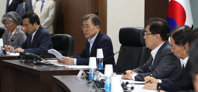 President Moon Jae-in (center) speaks during a meeting of the National Security Council at Cheong Wa Dae on Tuesday. (Yonhap)