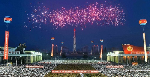 North Koreans celebrate with a mass gathering and fireworks the test-fire of the regime's first intercontinental ballistic missile, Hwasong 14, in Pyongyang on Thursday. (Yonhap)