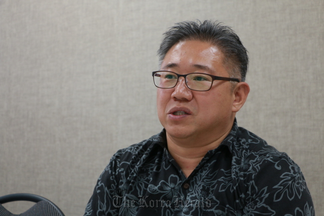 Kenneth Bae speaks during a recent interview with The Korea Herald at his office in Seoul. (Kim So-yeon/The Korea Herald)