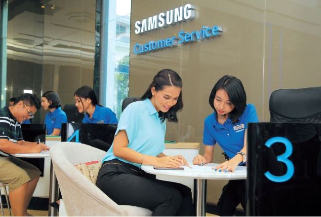 SAMSUNG IN MYANMAR -- Visitors receive consultations at Samsung Electronics’ premium service center that opened in Yangon, Myanmar last month. The tech giant said it opened the facility offering a one-stop venue for products, after service and other experiences. Myanmar with a population of 56 million has been rising as a promising market for global manufacturers. Samsung Electronics