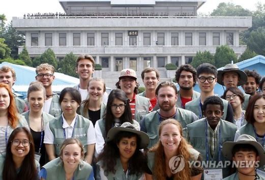 Participants in the Peace Camp for Youth program, organized by the South Korean government in 2016, pose for a photo at the truce village of Panmunjom in this undated file photo. (Yonhap)