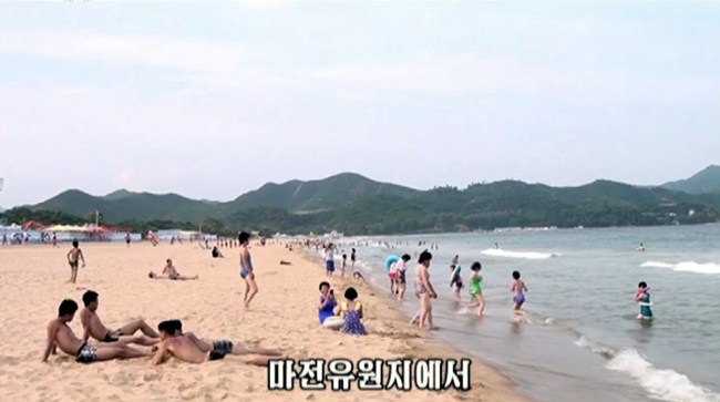 Pyongyang's mouthpiece Korea Central News Agency broadcasts about North Koreans relaxing on a beach.