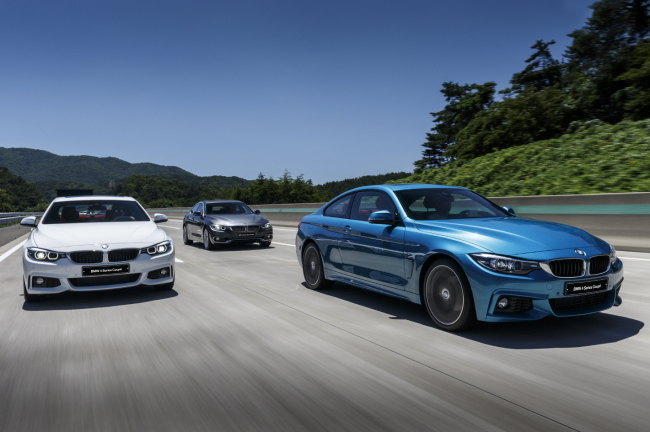 New BMW 4-series are seen on a test drive in Busan, Friday. (BMW Korea)