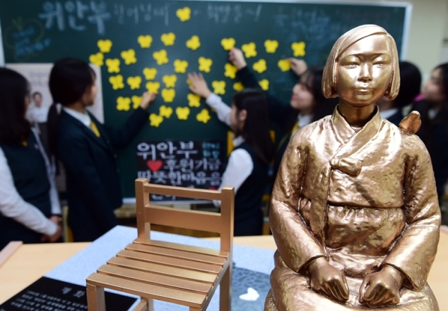 A miniature “comfort woman” statue inside a high school classroom in Incheon. Okyrun Girls’ High School