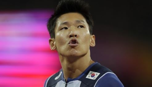 In this Associated Press photo, Kim Kuk-young of South Korea reacts after finishing his men's 100m heat at the International Association of Athletics Federations (IAAF) World Championships in London on Aug. 4, 2017. (Yonhap)