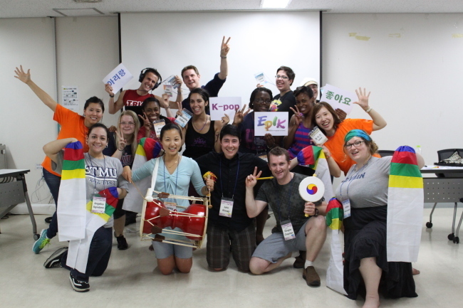Native-speaking English teachers pose in this photo, which is not directly related to the article. (EPIK)