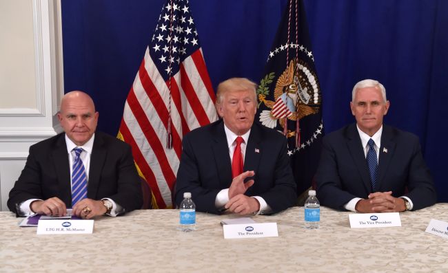 US President Donald Trump (center) speaks to reporters after a security briefing with National Security Adviser H.R. McMaster (left) and Vice President Mike Pence at Trump's golf estate in Bedminster, New Jersey, Thursday. (AFP-Yonhap)