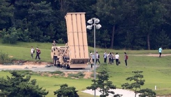 Officials from the defense and environment ministries conduct a joint environmental survey of electromagnetic radiation and noise of the Terminal High Altitude Area Defense system in Seongju, North Gyeongsang Province, on Aug. 12, 2017. (Yonhap)