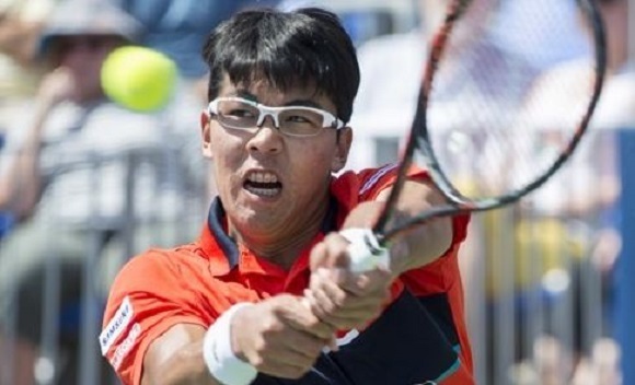 In this Associated Press file photo taken on Aug. 8, 2017, Chung Hyeon of South Korea hits a shot against Feliciano Lopez of Spain during the first round of the Rogers Cup tennis tournament in Montreal. (Yonhap)