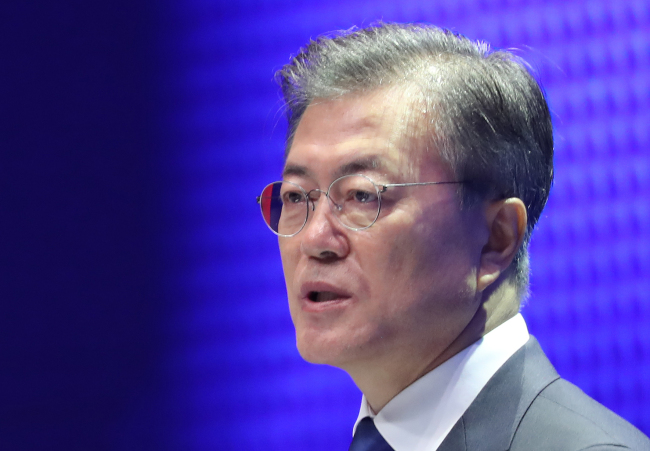 President Moon Jae-in delivers his Liberation Day speech at the Sejong Center for the Performing Arts in downtown Seoul on Tuesday. (Yonhap)