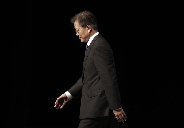 President Moon Jae-in leaves after a ceremony to celebrate Korean Liberation Day, at Seong Cultural Center in Seoul, South Korea, Tuesday, Aug. 15, 2017. (AP)