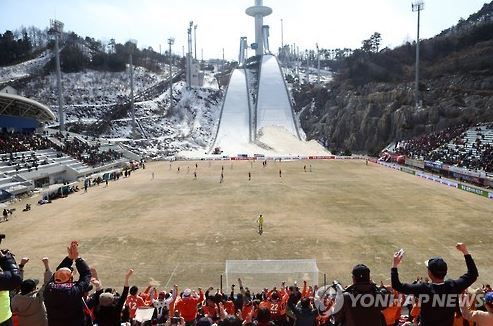 This file photo taken on March 11, 2017, shows fans watching the K League Classic match between Gangwon FC and FC Seoul at the Olympic Ski Jumping Centre in PyeongChang, Gangwon Province. (Yonhap)