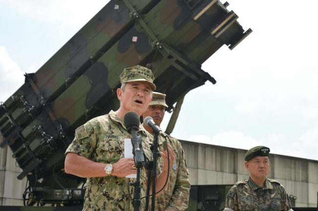 Adm. Harry Harris talks during a press conference at Osan Air Base in South Korea. (Yonhap)
