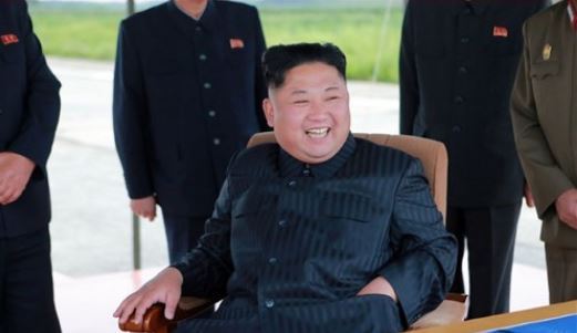 This photo released by North Korea's state news agency on Aug. 30, 2017, shows North Korean leader Kim Jong-un guiding the firing of a Hwasong-12 intermediate-range ballistic missile, which flew over Japan a day earlier. (Yonhap)