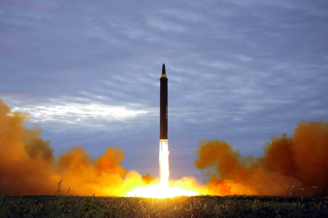 This Aug. 29, 2017 photo distributed on Wednesday, Aug. 30, 2017, by the North Korean government shows what was said to be the test launch of a Hwasong-12 intermediate range missile in Pyongyang, North Korea. (AP-Yonhap)