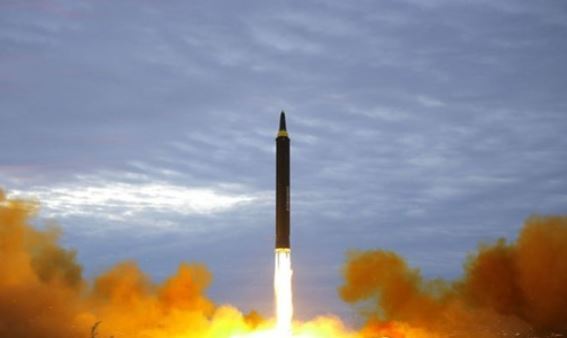 This photo released by North Korea's state news agency on Aug. 30, 2017, shows North Korea's firing of a Hwasong-12 intermediate-range ballistic missile, which flew over Japan a day earlier. (Yonhap)