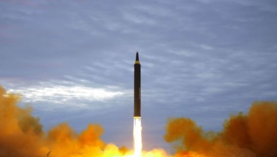 This photo released by North Korea's state news agency on Aug. 30, 2017, shows North Korea's firing of a Hwasong-12 intermediate-range ballistic missile, which flew over Japan a day earlier. (Yonhap)