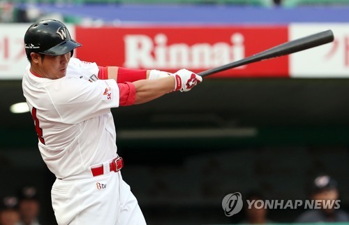 Choi Jeong of the SK Wyverns launches a three-run home run off the Hanwha Eagles during the clubs' Korea Baseball Organization game at Incheon SK Happy Dream Park in June. (Yonhap)