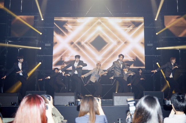 Ten-piece boy band Pentagon performs during a media showcase for its fourth EP “Demo_01” in Seoul on Wednesday. (Cube Entertainment)