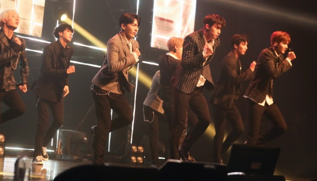 Ten-piece boy band Pentagon performs during a media showcase for its fourth EP “Demo_01” in Seoul on Wednesday. (Yonhap)