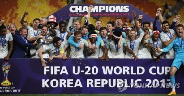 In this file photo taken June 11, 2017, England national football team players celebrate after winning the FIFA U-20 World Cup in South Korea. (Yonhap)