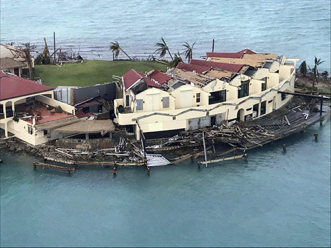 This photo provided on Friday, Sept. 8, 2017, shows storm damage in the aftermath of Hurricane Irma in Virgin Gorda’s Saba Rock in the British Virgin Islands. Irma scraped Cuba’s northern coast Friday on a course toward Florida, leaving in its wake a ravaged string of Caribbean resort islands strewn with splintered lumber, corrugated metal and broken concrete. (AP)