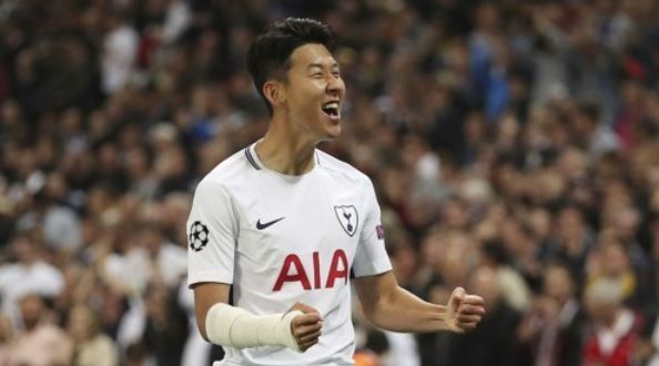 In this photo released by The Associated Press on Sept. 13, 2017, Tottenham Hotspur's Son Heung-min celebrates after scoring a goal during the UEFA Champions League Group H match between Tottenham and Borussia Dortmund at Wembley Stadium in London. (Yonhap)