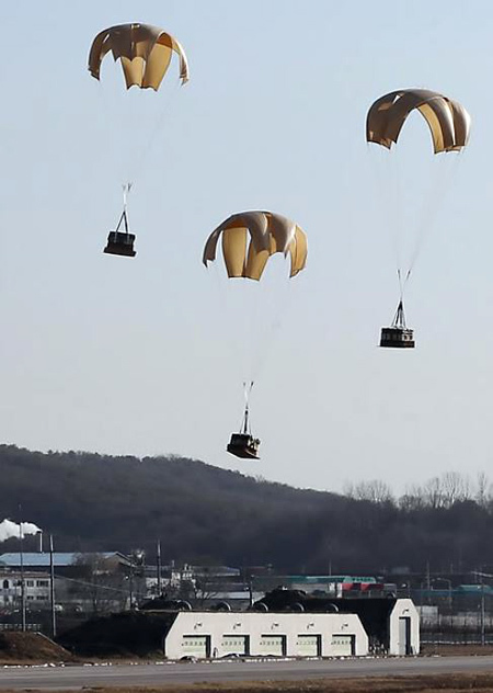 This undated file photo shows South Korea's Air Force conducting a cargo air-drop exercise. (Yonhap)