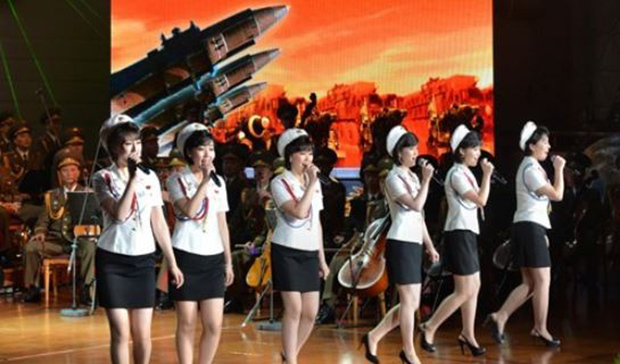 This photo, carried by Uriminzokkiri on July 31, 2017, shows a female band performing in Pyongyang to celebrate its July 28 ICBM launch. (Yonhap)