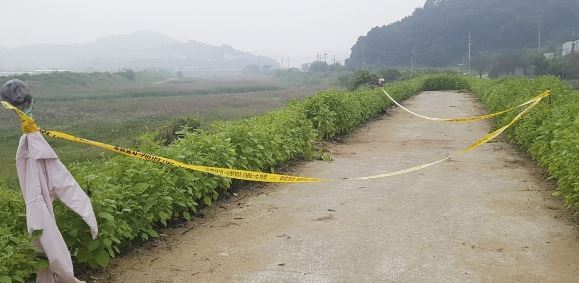 A woman's body was found near a riverbank in Cheongju, North Chungcheong Province, early Tuesday