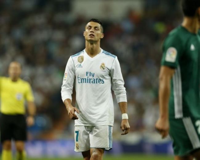 Real Madrid's Cristiano Ronaldo closes his eyes during Spanish the La Liga soccer match between Real Madrid and Real Betis at the Santiago Bernabeu stadium in Madrid, Wednesday, Sept. 20, 2017. Betis won 1-0. (AP)